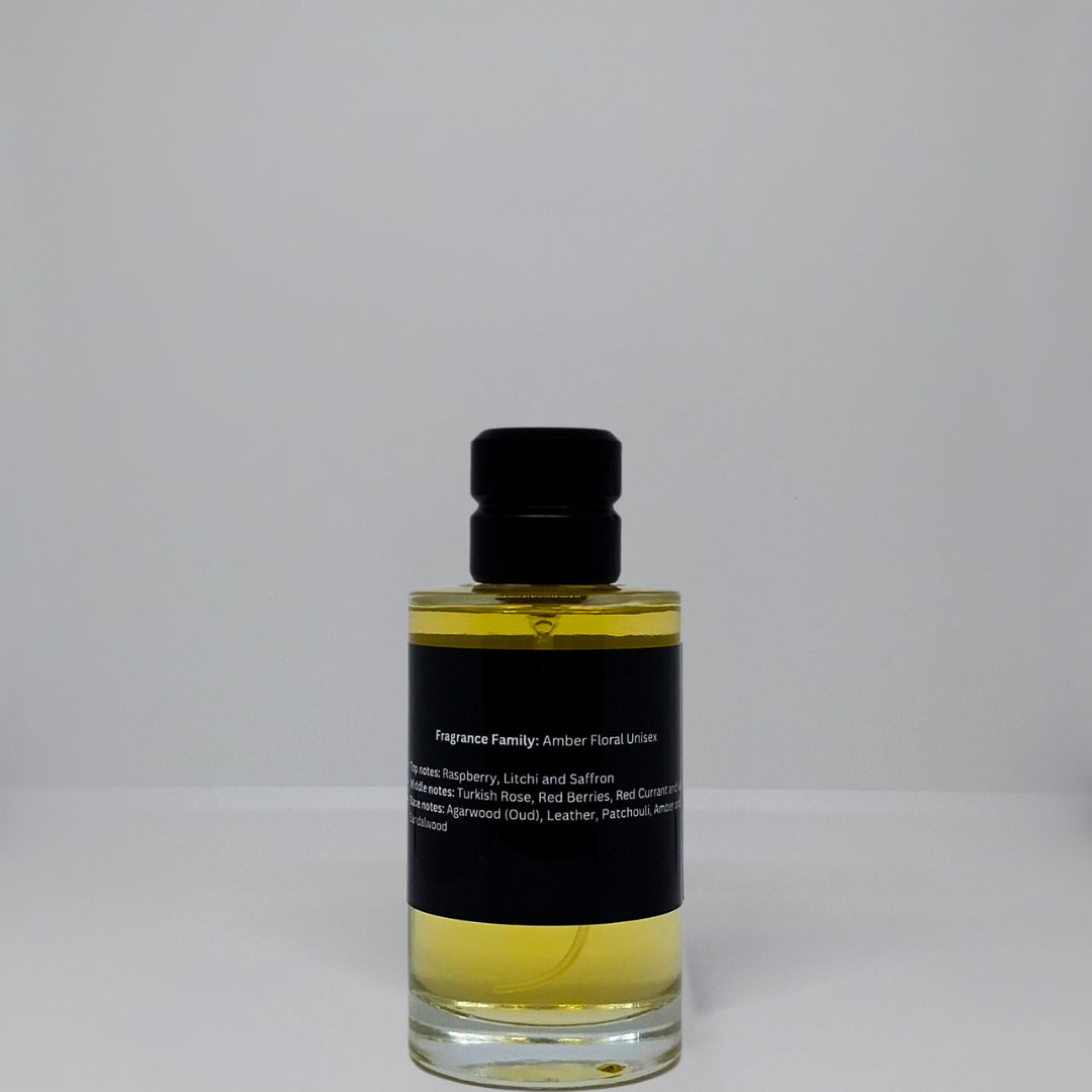 A bottle of Amber Floral Unisex fragrance with a black label detailing its ingredients.