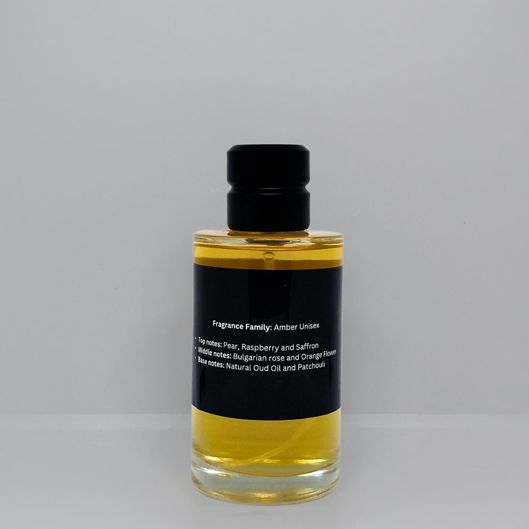 Amber fragrance bottle with a black label listing top, middle, and base notes.