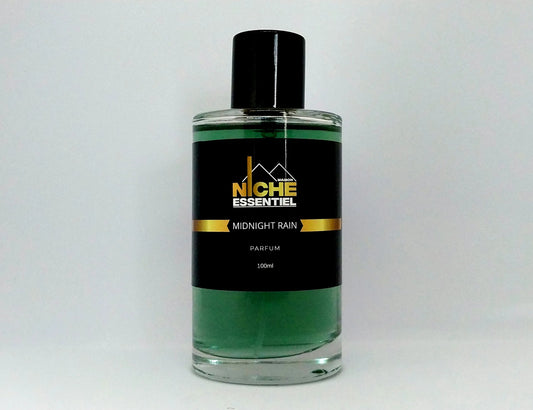 100ml bottle of Niche Essentiel Midnight Rain perfume with a black label and green liquid.