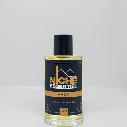 100ml bottle of Niche Essentiel Sexy perfume with a black and gold label.
