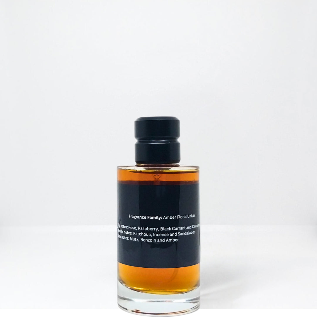 Amber floral unisex fragrance bottle with a black label listing ingredients and notes.