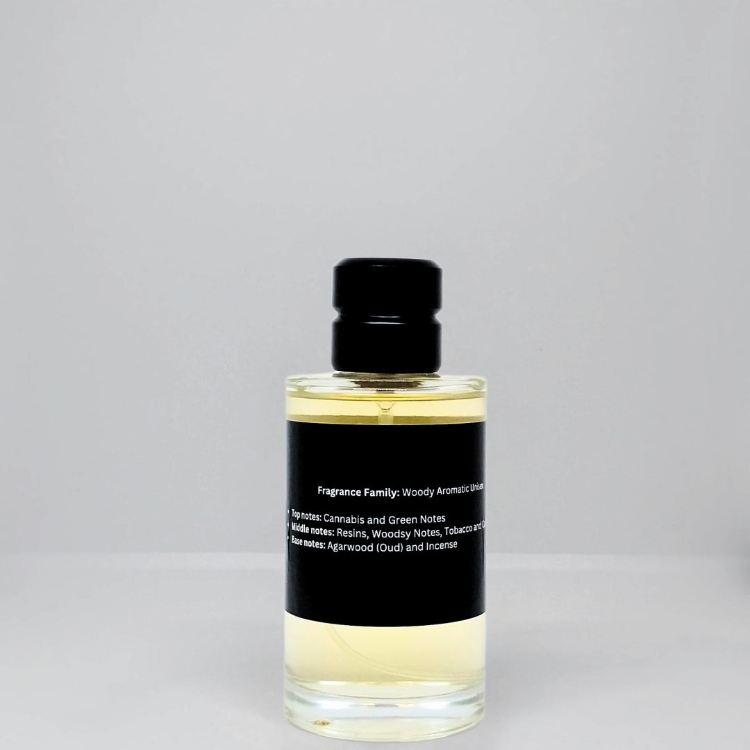 Clear glass fragrance bottle with a black label and a black cap, containing a yellow liquid.
