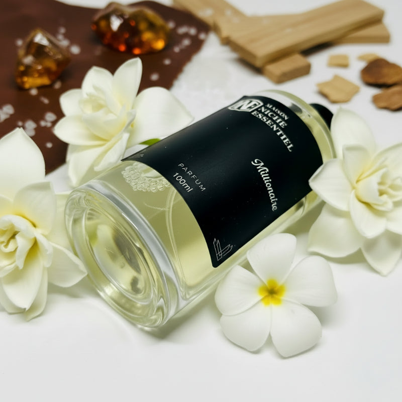 Close-up of a 100ml bottle of Millionaire perfume with a black label.